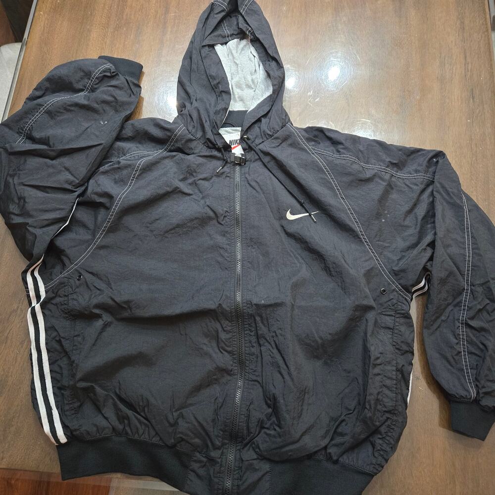 vintage Nike 90s hooded windbreaker jacket. 
Men's size xl